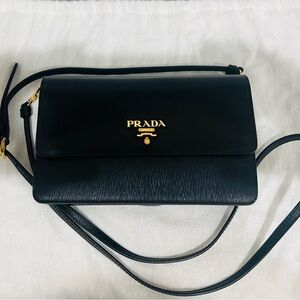 PRADA Saffiano leather black mini bag.